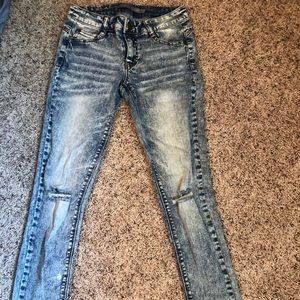 Acid wash jeans w/ rip at knees size 5